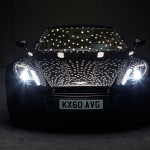 OLEDs reflecting in the car body of Aston Martin One-77