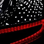 OLEDs reflecting in the car body of Aston Martin One-77