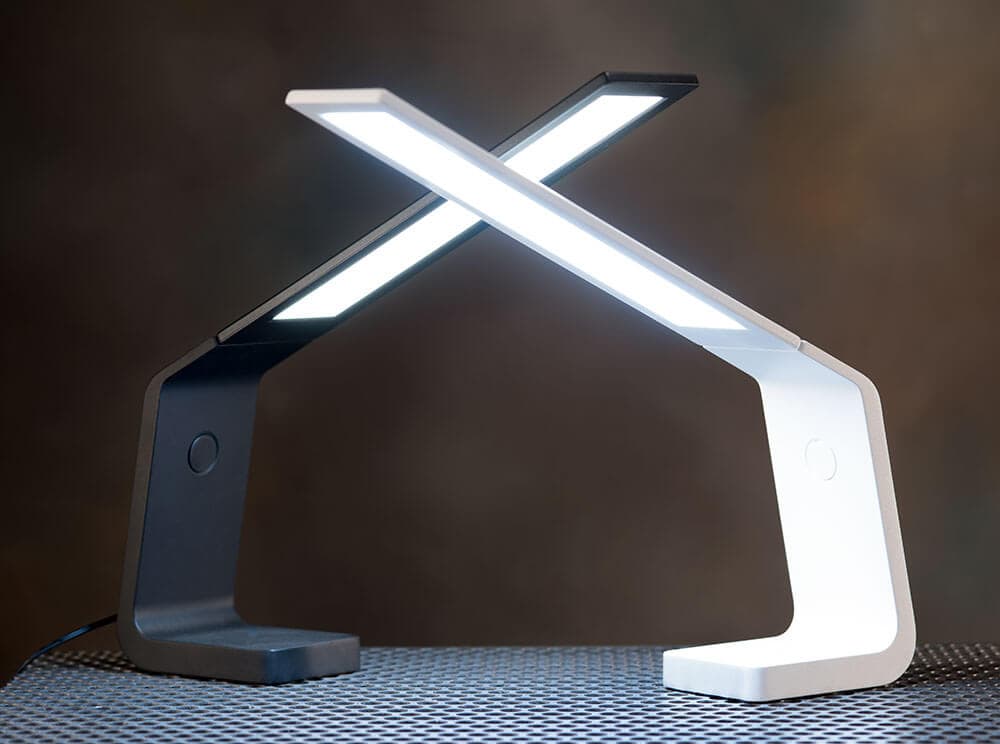 Ascend OLED desk lamp in black and white