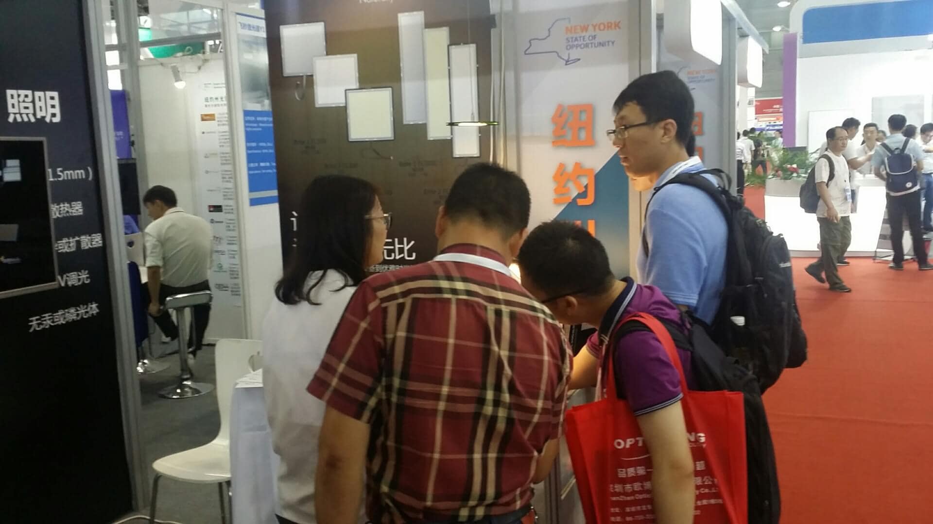 interested visitors at OLEDWorks booth at CIOE in Shenzhen
