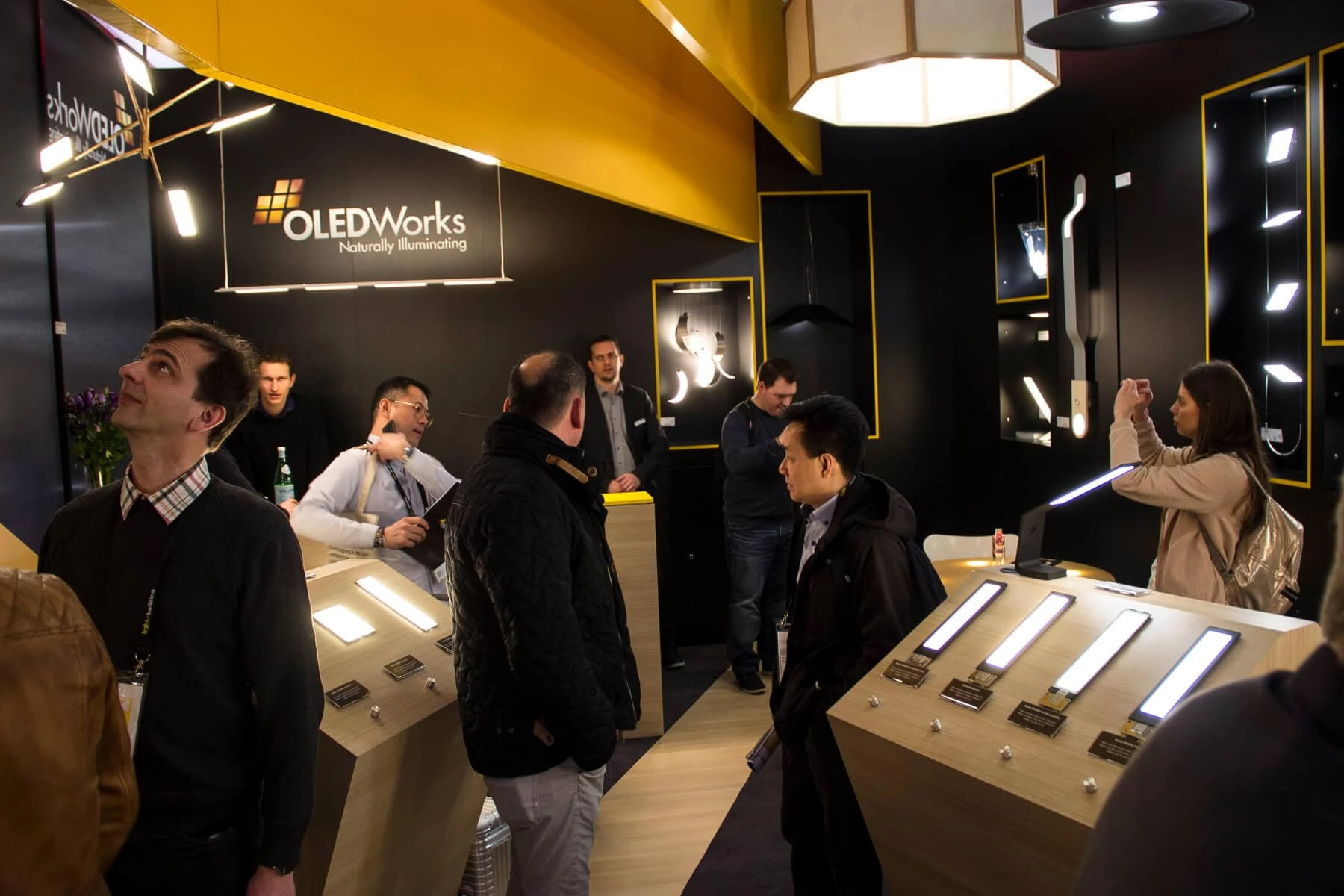crowded OLEDWorks booth at Light + Building 2018