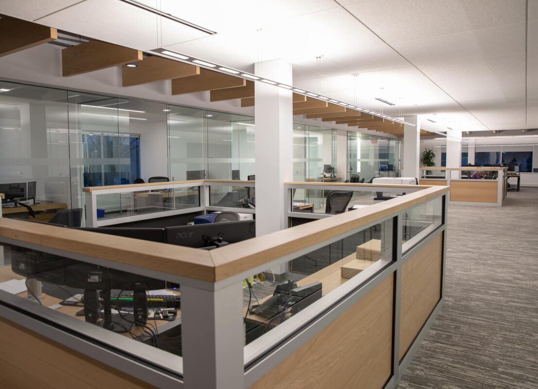 OLED pendant luminaire Olessence Slim from Acuity Brands in open office area of QCI