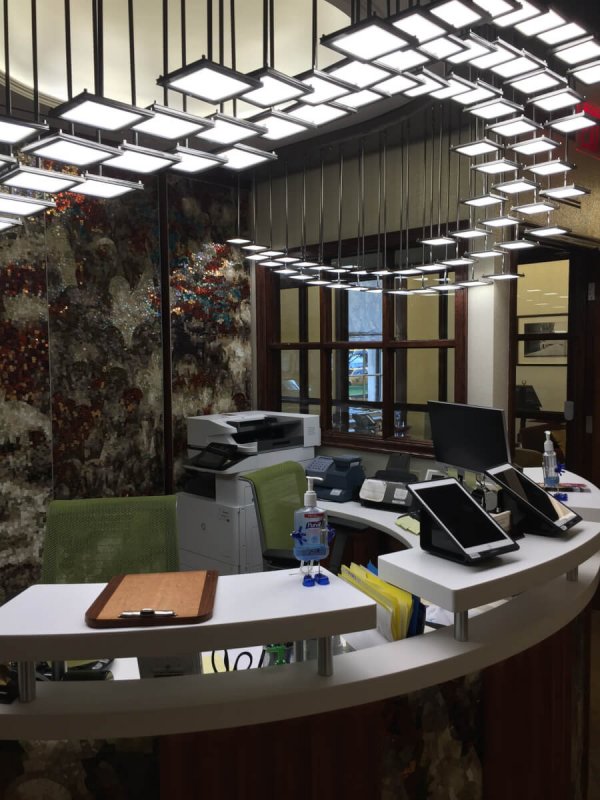 OLED lighting fixture in the reception area of dentist office in NYC