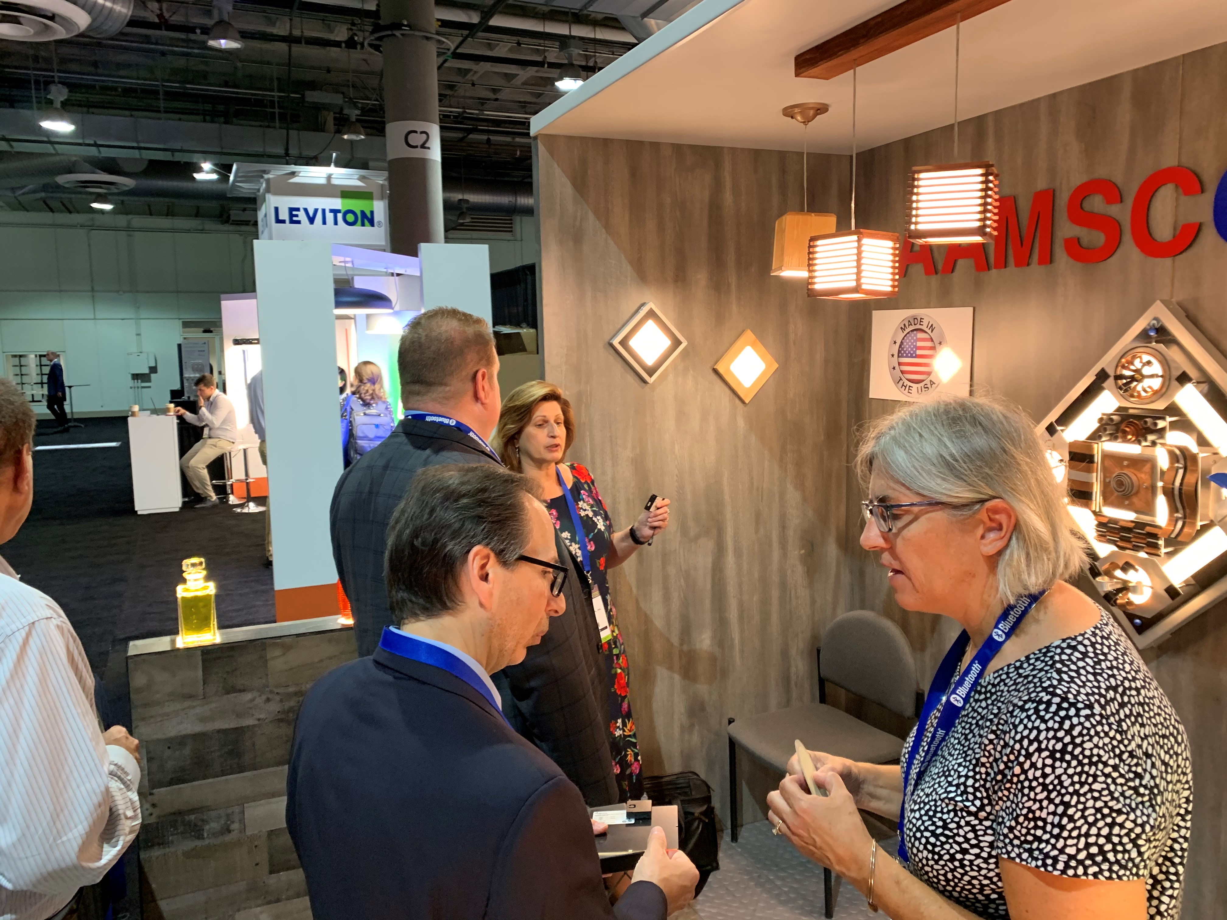 OLEDWorks' Giana talking to Aamsco visitors at LSW 2019 | OLEDWorks