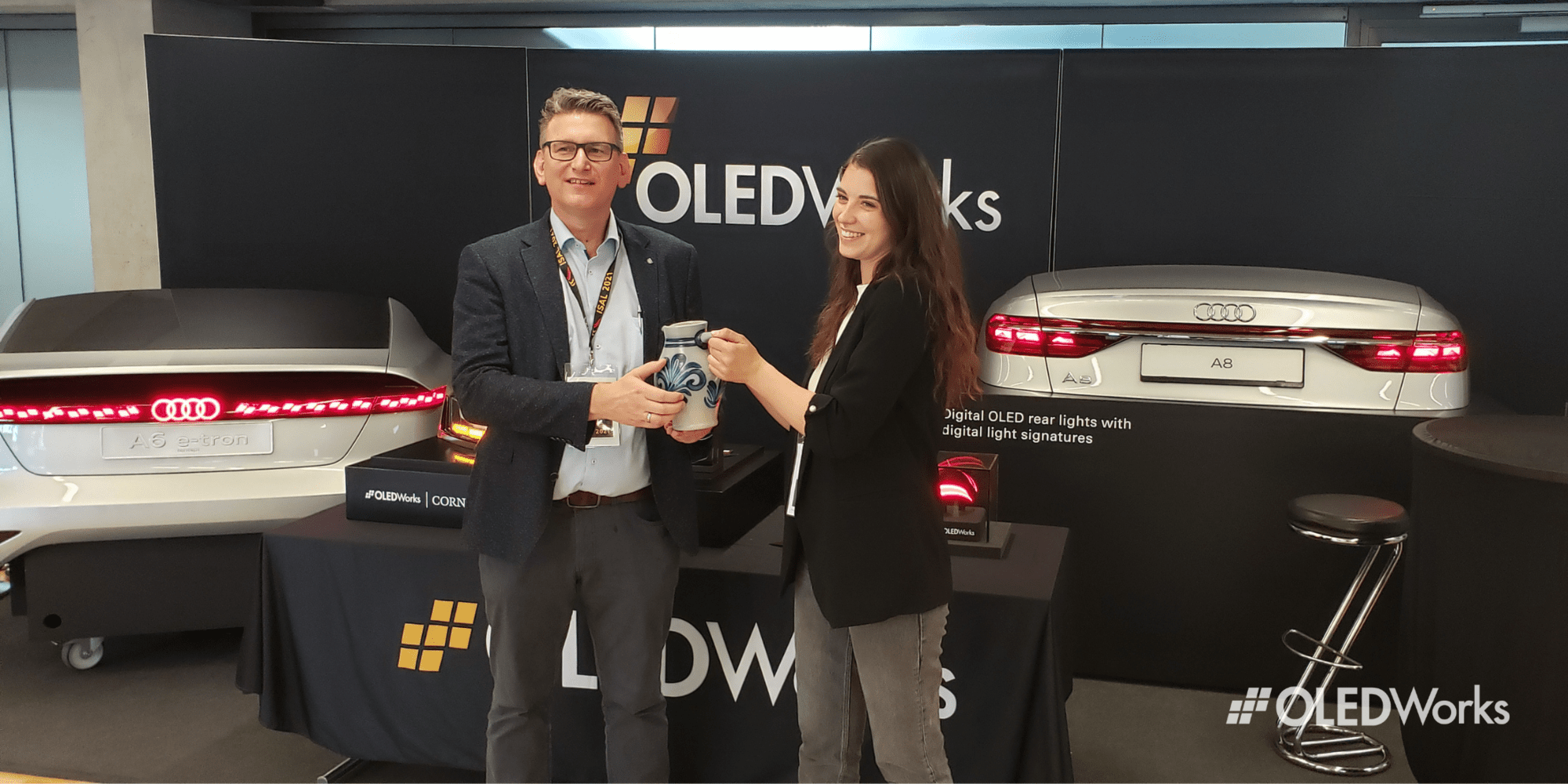 OLEDWorks accepting ISAL social media award